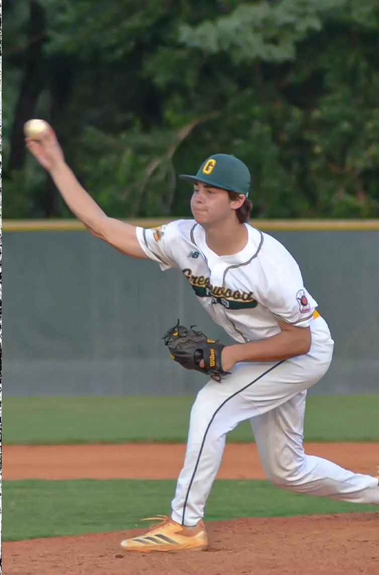 baseball player throwing ball